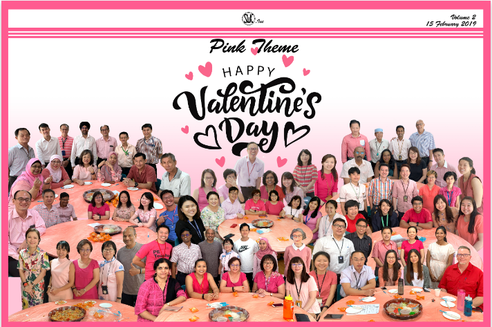 A group of people dressed in pink wishing everyone a happy valentine day